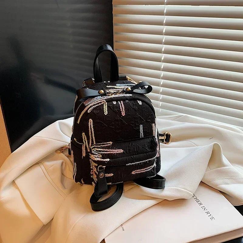 Sac à dos produit à fermeture éclair en nylon de couleur unie, ceinture à coussin d'air, sac à dos de mode haute beauté, nouveau sac souple style universitaire