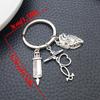 Antique Silver Medical Series Keychain: Syringe, Stethoscope, Heart, Ambulance, and ECG Zinc Alloy Pendant