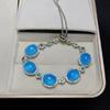 Light Luxury Sapphire Blue Oval Bead Four-piece Necklace Earrings Ring Bracelet Flash Diamond Dress Temperament Jewelry Set