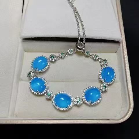 Light Luxury Sapphire Blue Oval Bead Four-piece Necklace Earrings Ring Bracelet Flash Diamond Dress Temperament Jewelry Set