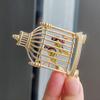 New Simple and Elegant Retro Birdcage Style Brooch Bird Corsage Dripping Oil
