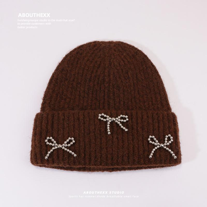 

Корейская шляпа с жемчужным бантом для женщин на осень и зиму, свободная вязаная шапка для большой головы, японская теплая шапка из пряжи для защиты ушей от холода M（56-60cm）