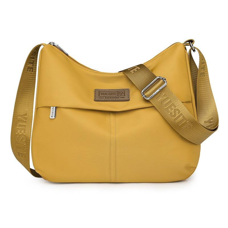 Einfacher und großzügiger Schulterrucksack Vielseitige, spritzwassergeschützte Nylontasche mit großem Fassungsvermögen Modetrend schräg getragener Damenrucksack