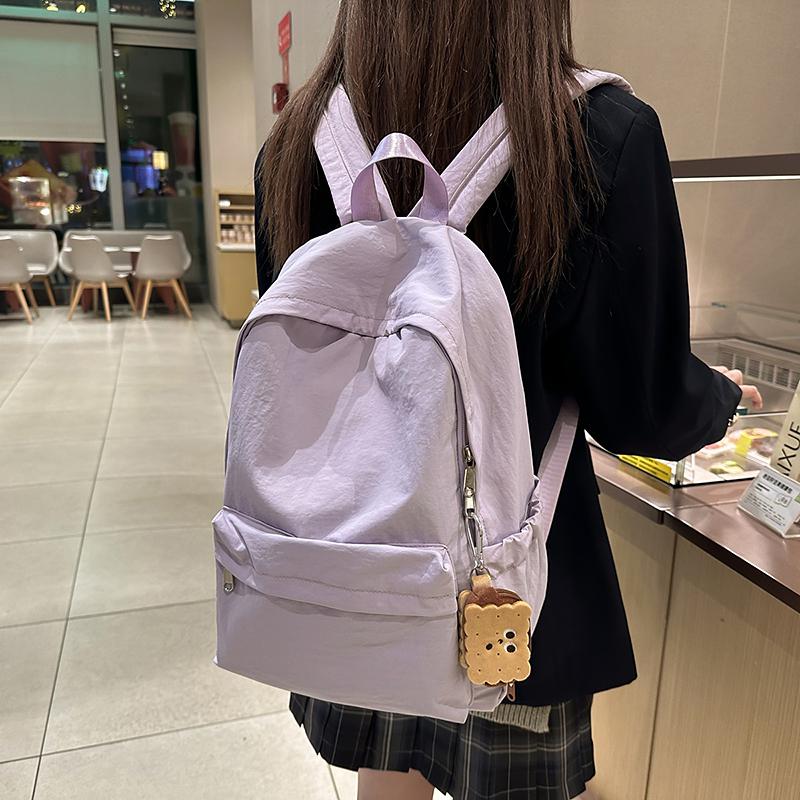 Simple Student Backpack with Large Capacity Multiple Pockets Casual and Lightweight Suitable for Daily and Student Use