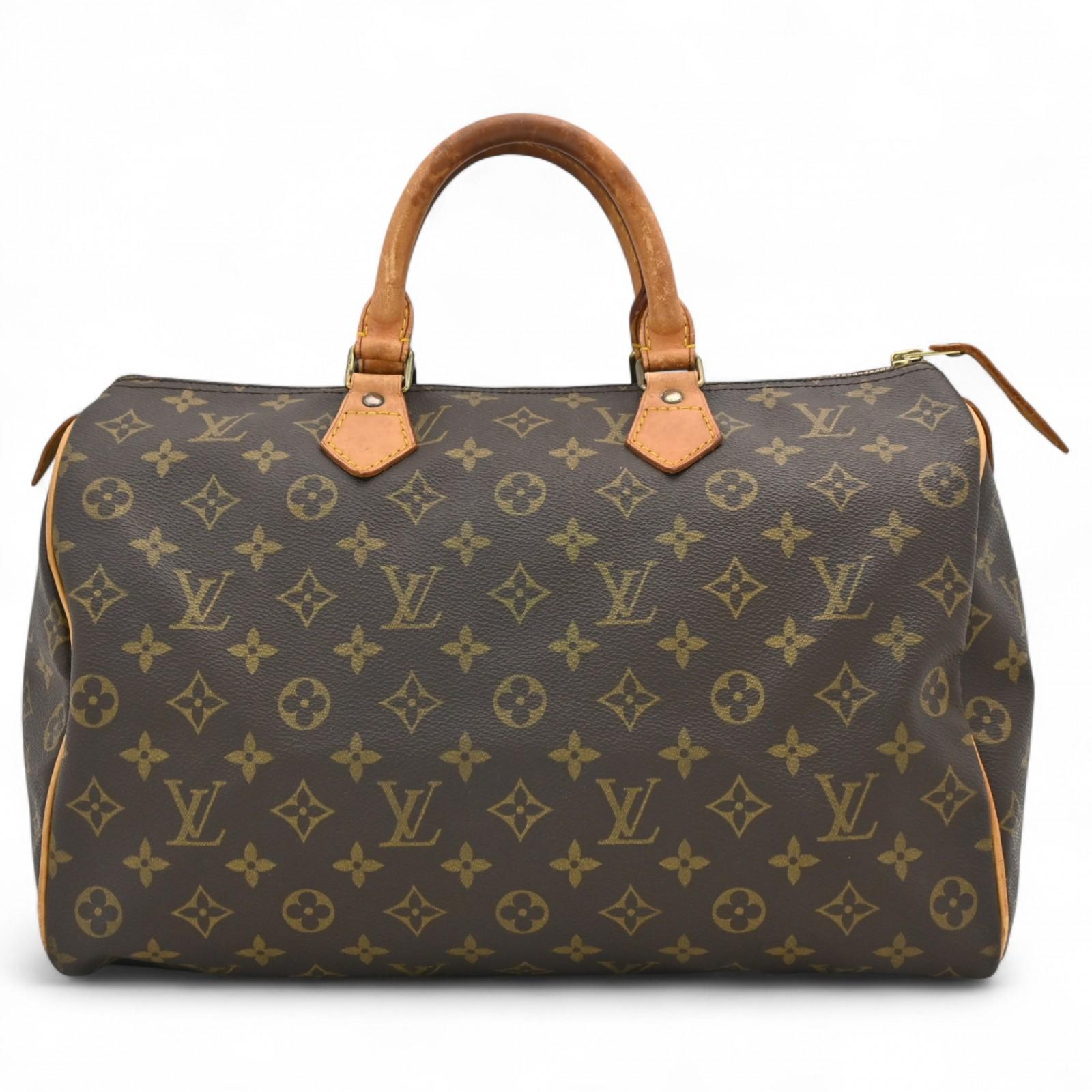 

Auth LOUIS VUITTON Monogram Speedy 35 Boston Bag Brown Canvas Women’s lv9843gh