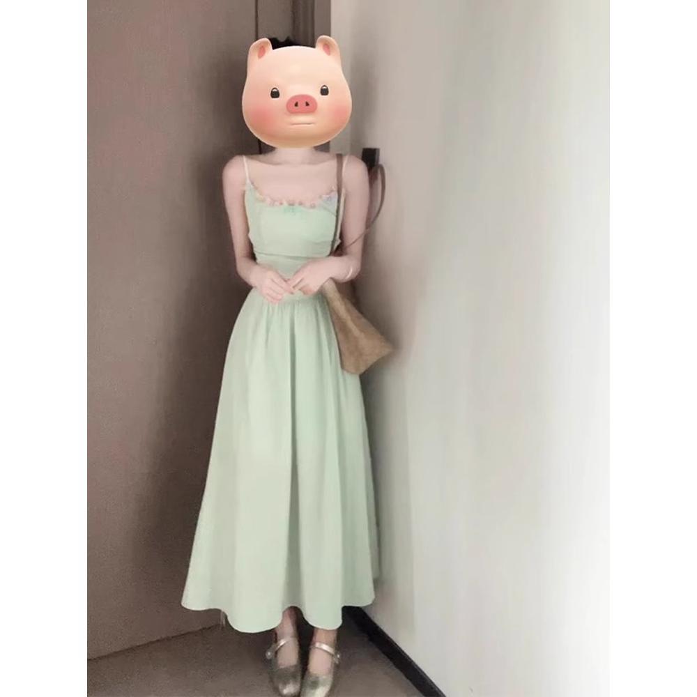 Summer atmosphere small skirt seaside vacation halter suspender dress women's summer new French temperament long dress