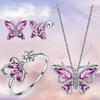 Four-piece set of butterfly stud earrings and rings with stylish, multicolored pendants, perfect for women's daily wear.