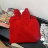 Wear a red sweater with autumn and winter cherries, and a chic lantern sleeve top in the Year of the Dragon tea