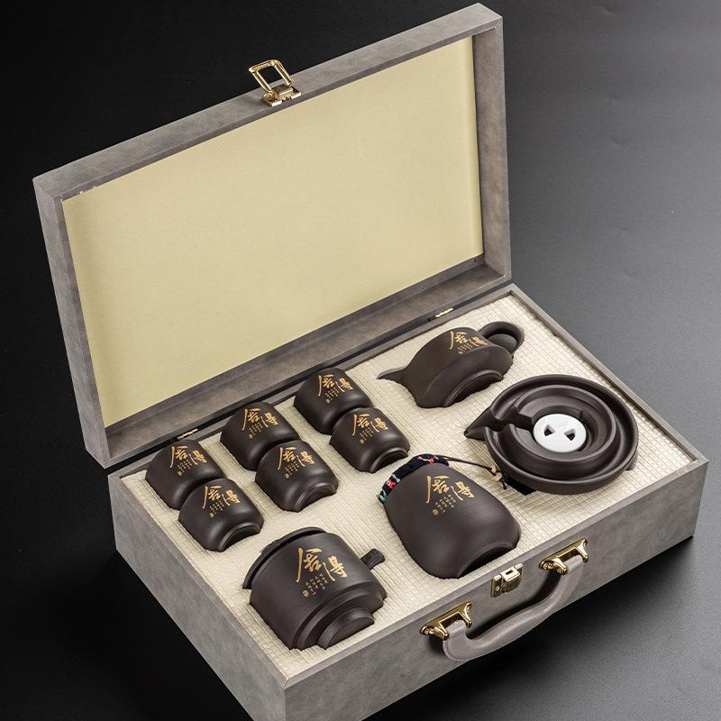 Purple sand tea set   new lazy tea brewer automatically rotates the water outlet Kung Fu tea cup gift box as a gift.