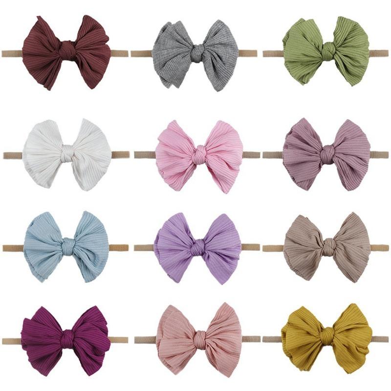 

New, baby pit strip elastic bow headband headband, soft and fashionable children s jewelry hairpin.