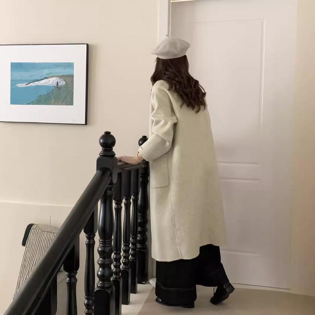 New double-sided wool coat, long big pocket horn wood buckle doll collar, thickened long wool cashmere coat.