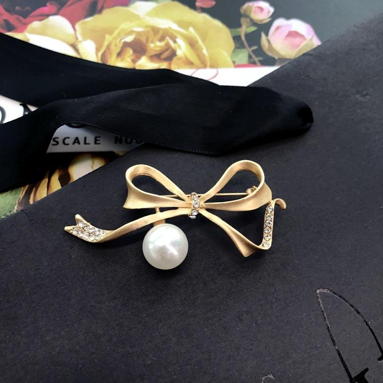 Fashion temperament dumb gold brooch corsage women's suit jacket sweater coat pin crystal high-end accessories