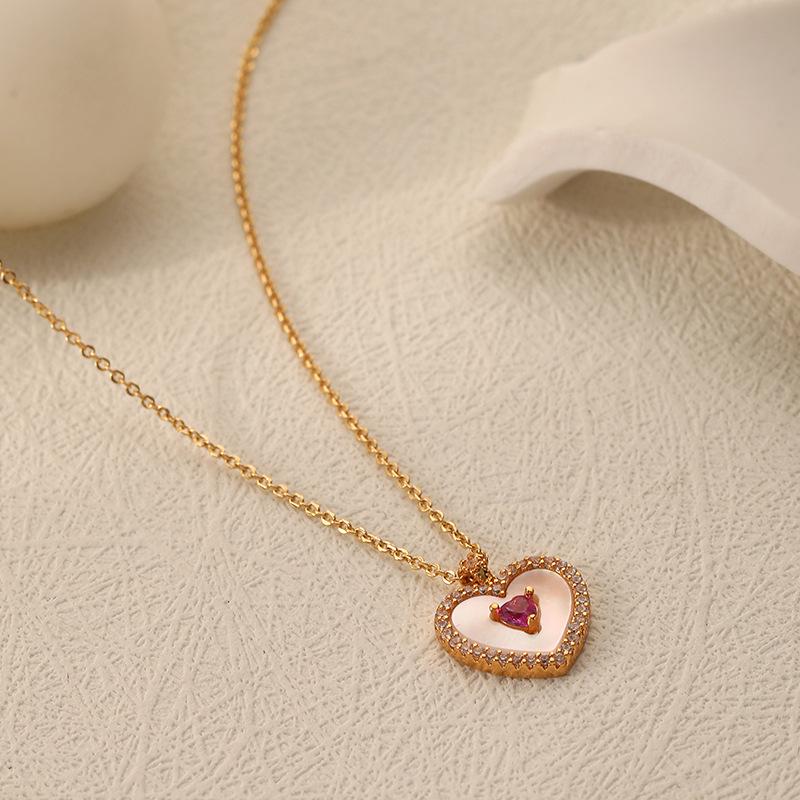

Minimalist Japanese & Korean Natural Mother-of-Pearl Heart Necklace – Versatile, Luxurious, High-End Clavicle Chain for Women.