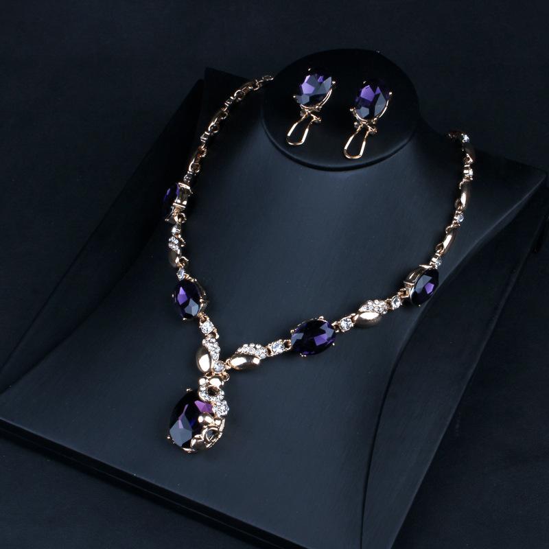 Chain European and American Crystal Gemstone Collarbone Chain Personalized Earrings Bracelet Ring Four-piece Set Sweater Chain