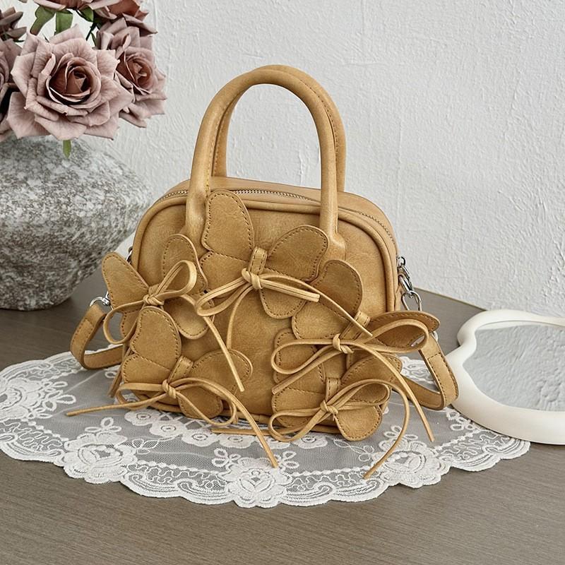 

Korean Style Ballet Bow Commuting One-shoulder Cross-body Bag Female Niche Design Three-dimensional Butterfly Bowling Handbag розовый