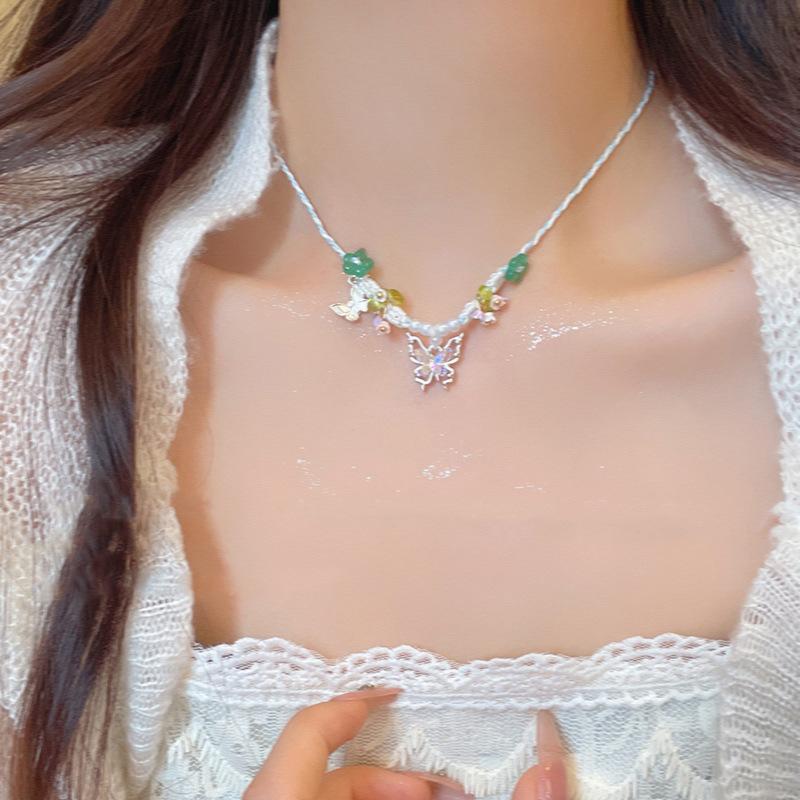 

Hand-woven flower pearl resin butterfly pendant necklace fashion personality collarbone chain women s sweet necklace