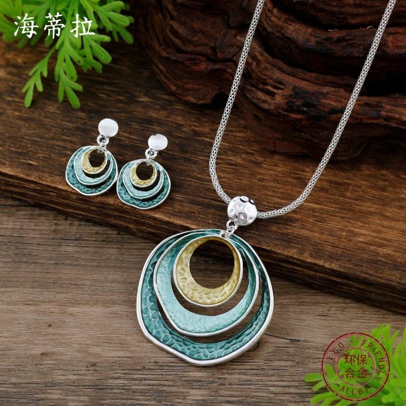 New enamel three-layer round ring stud earrings pendant set, women's simple and advanced sense hollow ring necklace