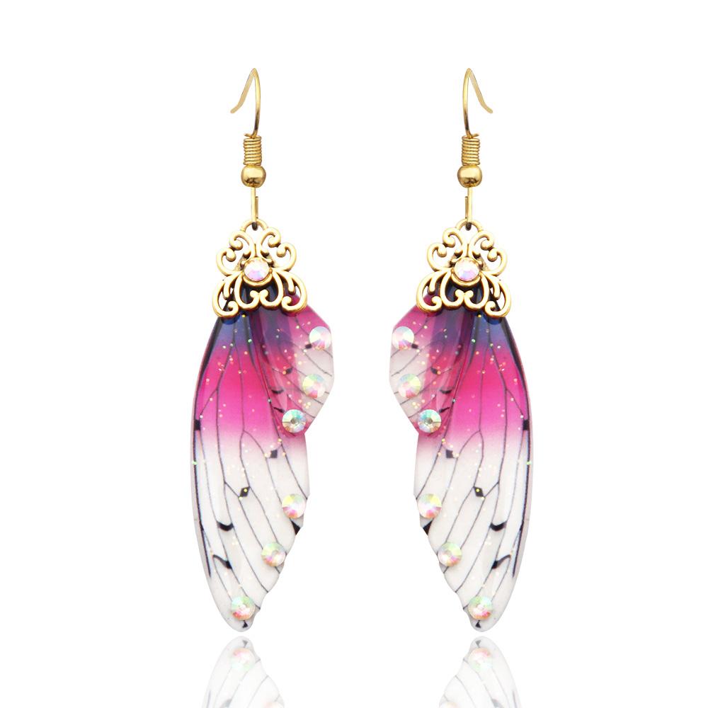 

Модні сережки з крильцями феї. Висячі сережки з райдужним градієнтом із смоли, імітація крил метелика. Висячі сережки для жінок. Модні ювелірні вироби.