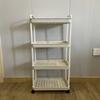 4-Tier Rolling Cart, Sturdy & Space-Saving. Perfect for Home, Office, Garage Storage. Easy Move, Durable Plastic Design.