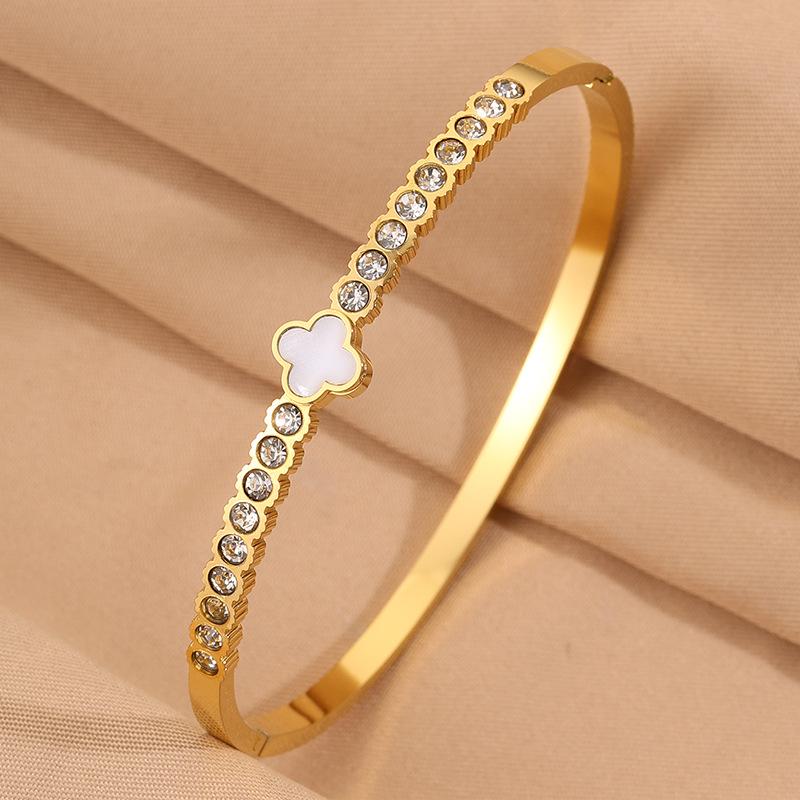 Titanium steel  women's light luxury high-end sense four-leaf flower with diamonds does not fade lucky grass open  
