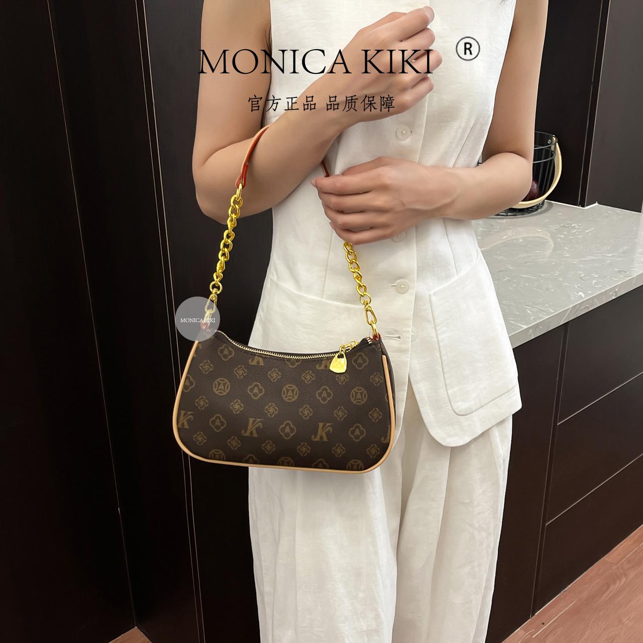 

Monica Qiqi light luxury European and American retro presbyopia contrasting color shoulder underarm bag 2025 new high-end women s commuter bag