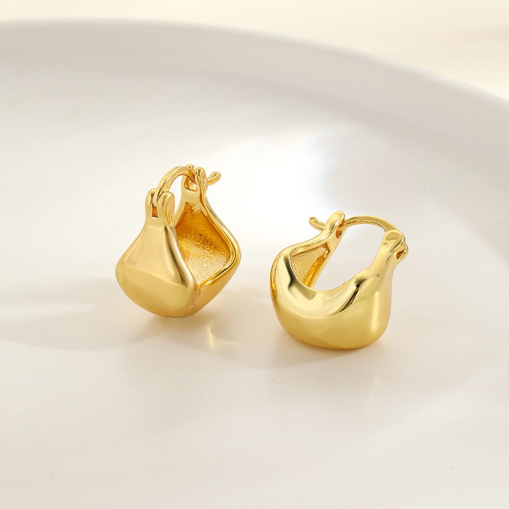 

Минималистичные серьги-капли с медным покрытием - Гладкая U-образная форма, Полый дизайн, Стойкий цвет для женщин