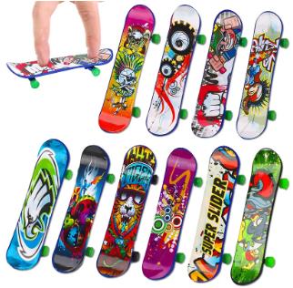 

12 Pcs Mini Skateboard Toys Plastic Creative Fingertip Skateboard for Kid Birthday Party Favors Desktop Game Toys Gift Filler