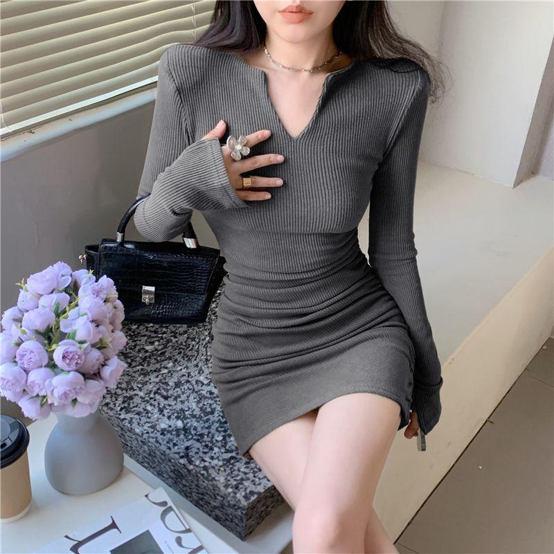 Autumn high-end women's clothing cold wind Spice girl pure desire V-neck hip-wrapped dress, small waist and thin short skirt