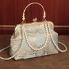Cheongsam bag temperament elegant dinner clip bag solemn portable mouth gold bag pearl bag crossbody