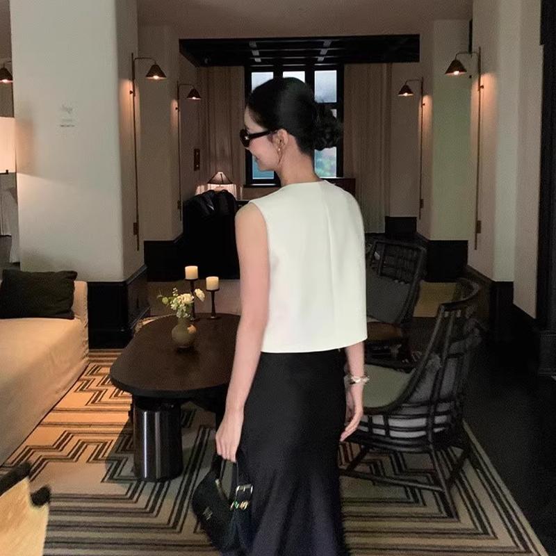 Dames fransk rund hals enkeltspent dobbel lomme ermeløs avslappet strikket vest