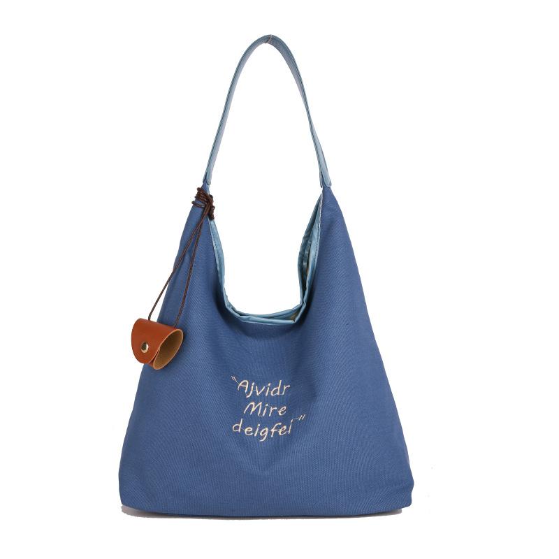 

Solid color letter simple women s work shoulder bag large capacity casual tote bag versatile handbag tide синій