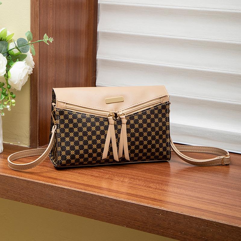 Women's bag, new women's change bag, niche bag, messenger bag, printed shoulder bag, one piece.