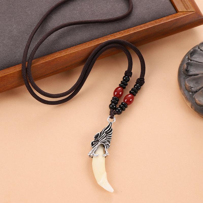 Retro woven dog tooth necklace men's and women's long niche personalized wolf tooth pendant pendant sweater chain accessories