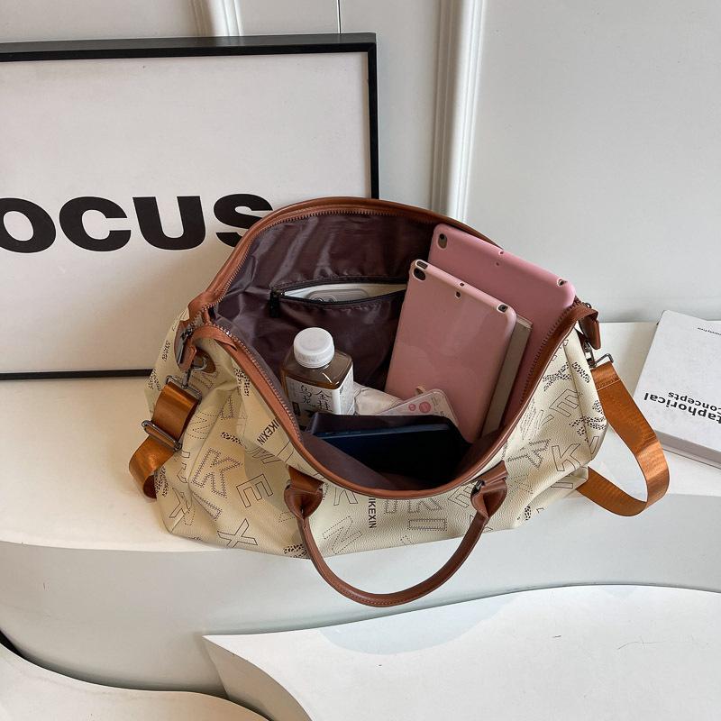 New large-capacity pu premium travel bag business travel bag women's fashion simple storage messenger fitness bag