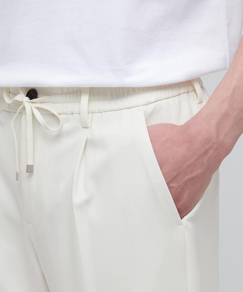 Musinsa Standard Lightweight Wide Drawstring Banded Crop Slacks [Cream]