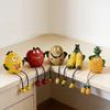 Fun Fruit Sculptures, Featuring Adorable Shapes And Designs Such As Pineapple, Banana, Lemon, And Orange.