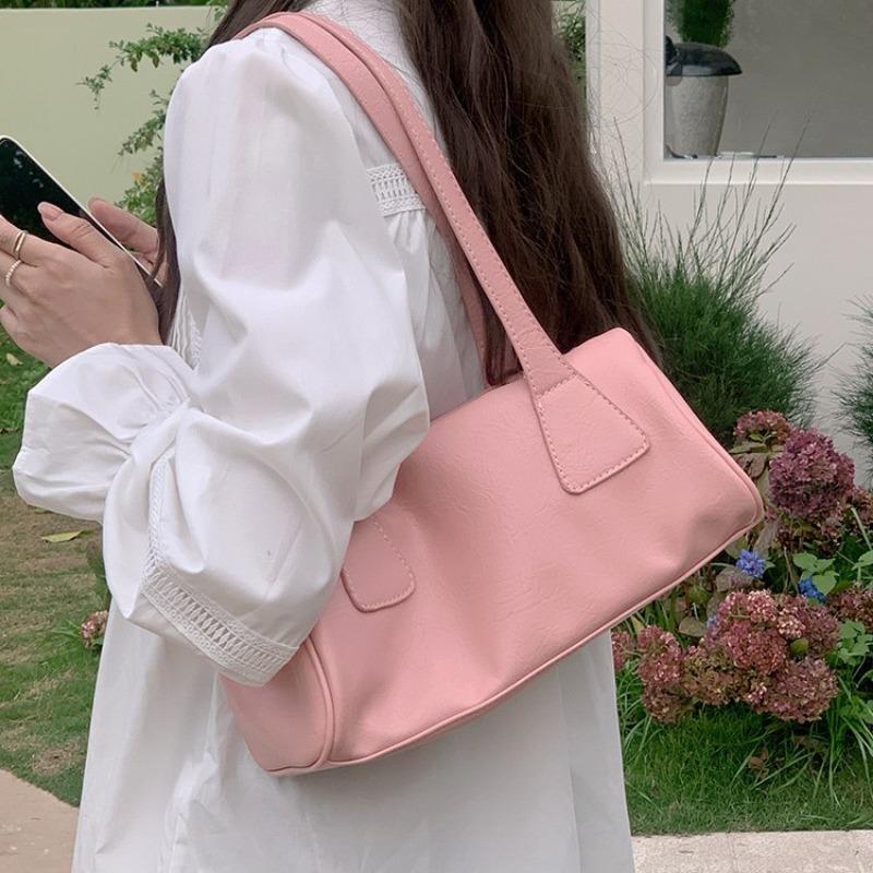 The Underarm Baguette Bag Is A Versatile and Casual Commuter Handbag and Shoulder Bag