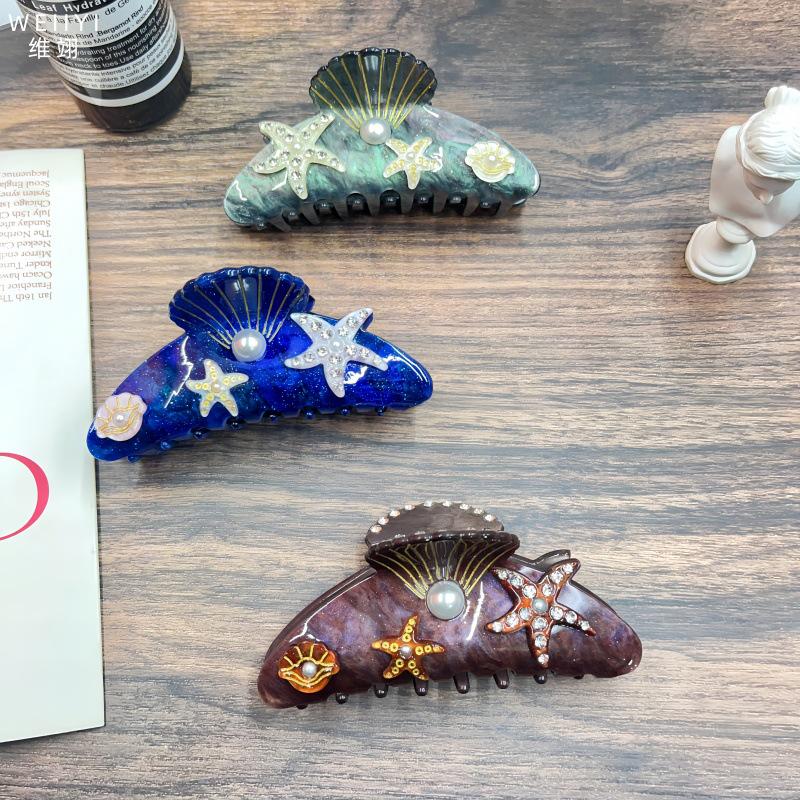 Elegant Starfish Rhinestone Hair Clip for Women - Acrylic, Stylish Bun Holder, High-End Accessories.