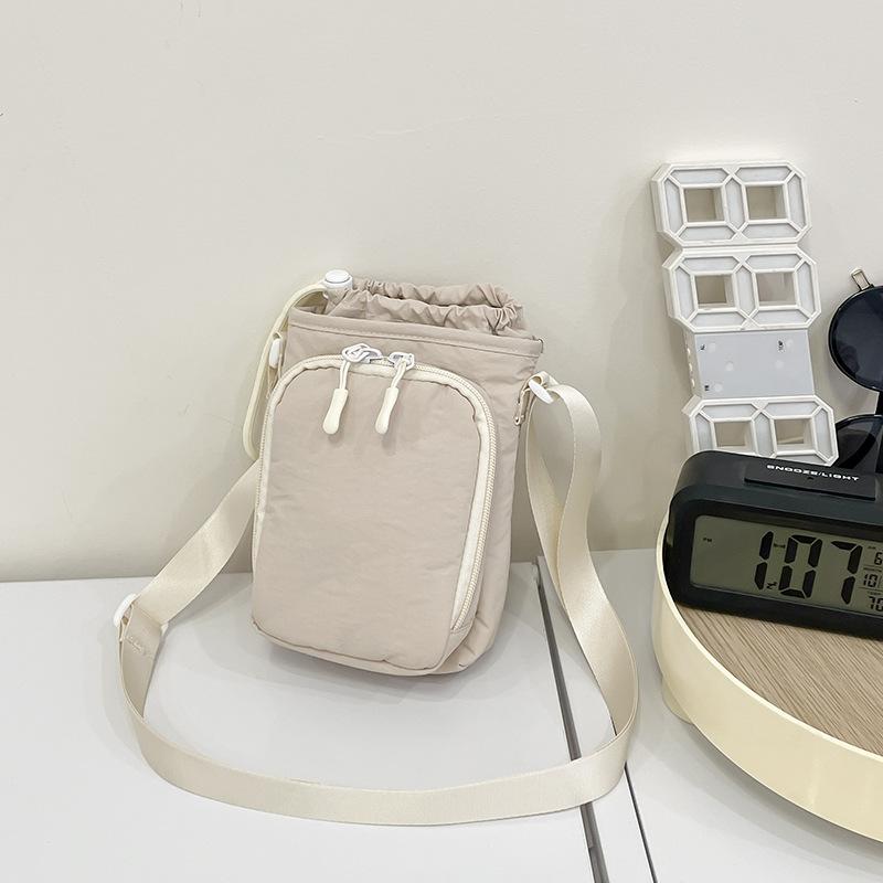 Crossbody bag women's new Korean version of simple solid color small square bag casual versatile mobile phone bag student water cup bag tide