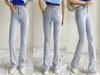 YPFF Trendy European & American Style Women's High Waist Slimming Flare Jeans with Heart Pocket.