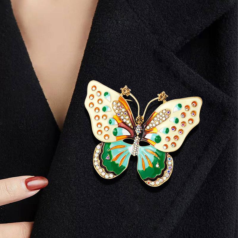 European and American vintage exaggerated rhinestone colored dripping butterfly brooch, chest flower girl