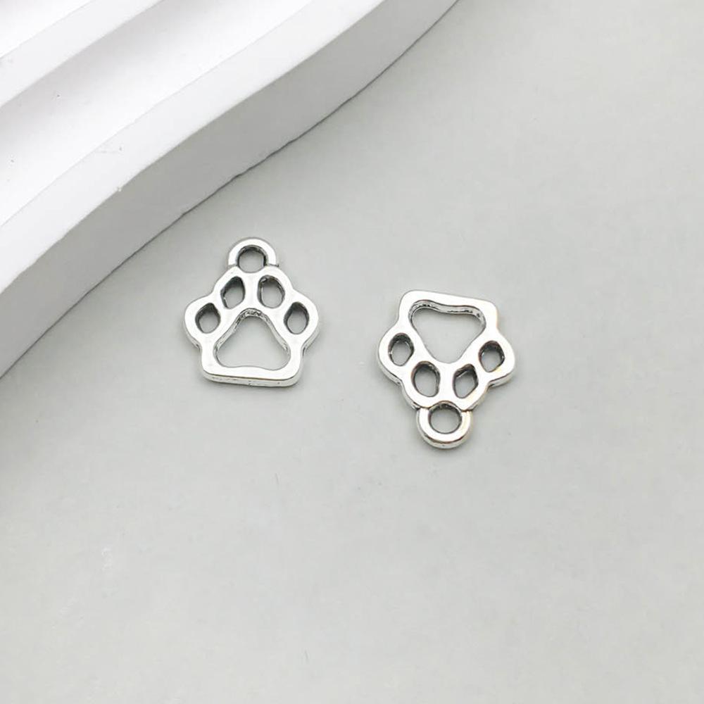 

Подвеска-шарм из серебряного сплава в виде кости животного, щенка