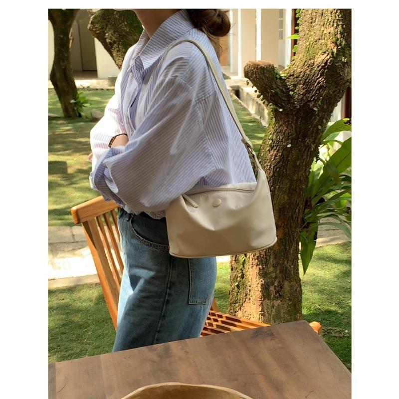 

2 new IAC homemade nylon cloth leather zipper shoulder hand-held underarm bag wind dumpling bag crossbody білий