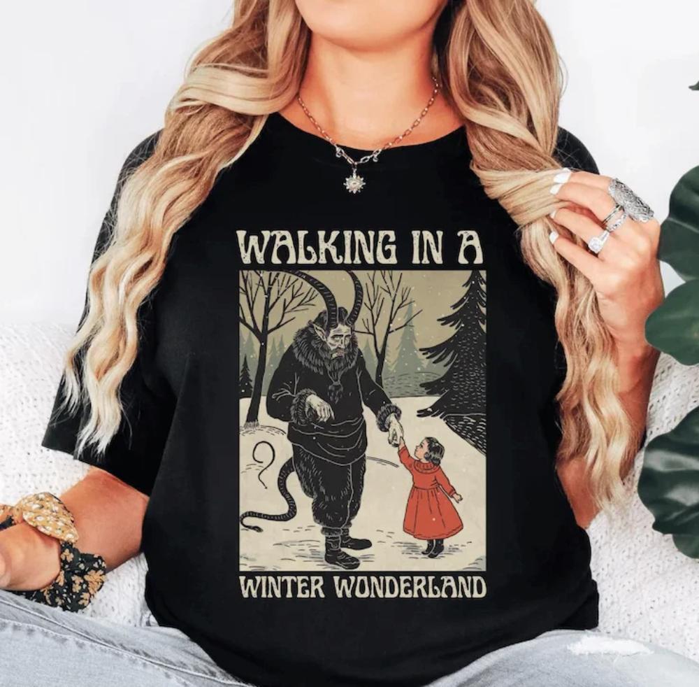 Krampus Gothic Walking in A Winter Wonderland T-Shirt A scary, dark, horror graphic t-shirt, short sleeve, women's unisex t-shirt.