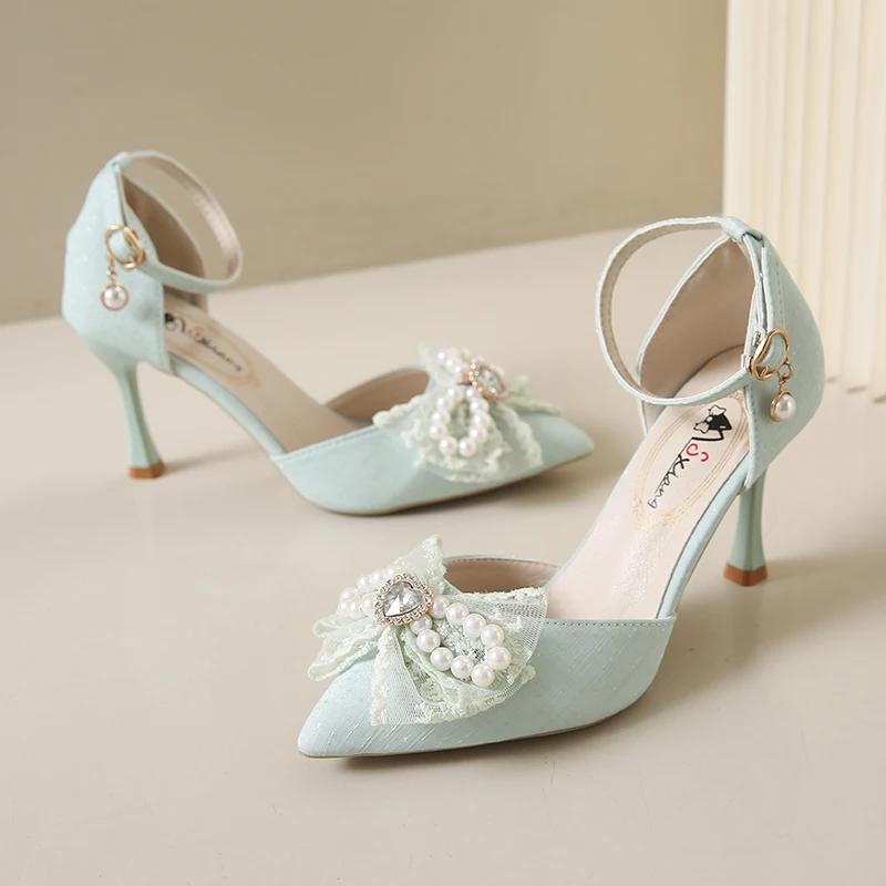 

Мода 2024 года, новые летние сандалии с бантом, женские, с острым тонким каблуком, пряжкой, в стиле феи, высокие каблуки, размер плюс 40 36 павлин голубой