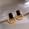 Elegant Gold-Plated Black Zircon Stud Earrings - Niche Design for a Luxurious Fashion Statement