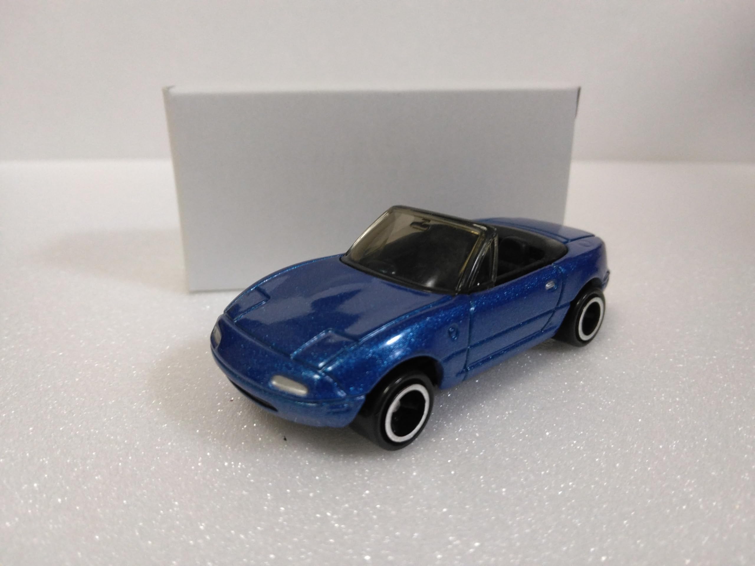 

Мини-автомобиль Tomica Mazda Eunos Roadster синий металлик, масштаб 164