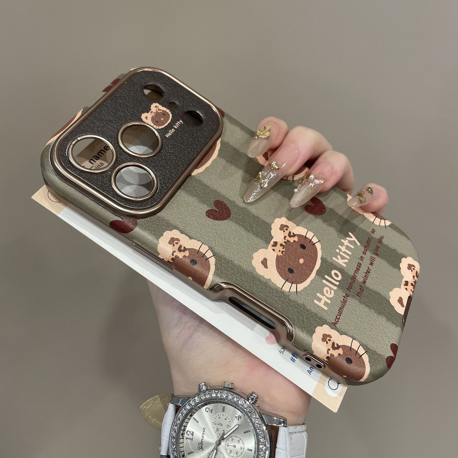 

Green Striped KT Cat Compatible with Apple 17 Pro Max Phone Case New iPhone 16 Premium Full Coverage Lens Autumn Winter Huawei MATE70PRO