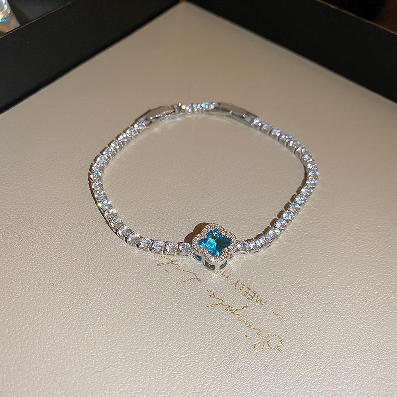 Pink Diamond Zirconia Starburst Flower Bracelet: Trendy, Luxurious Jewelry with Unique Design.