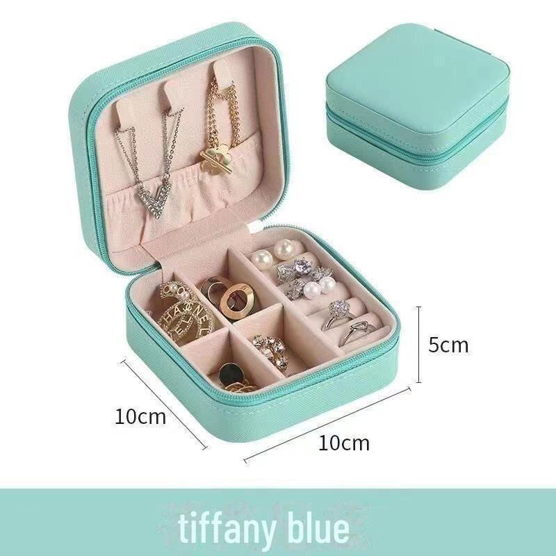 Exquisite Portable Jewelry Box: Compact Travel Storage for Earrings, Rings, and Necklaces.